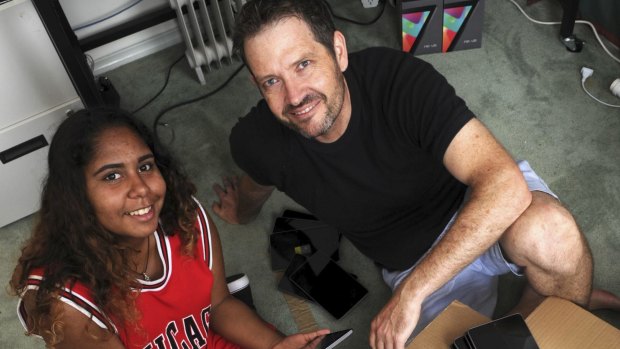 Indigenous Reading Project participant Yulcaila Hoolihan-Mongta, 15, with the project's founder Daniel Billing.