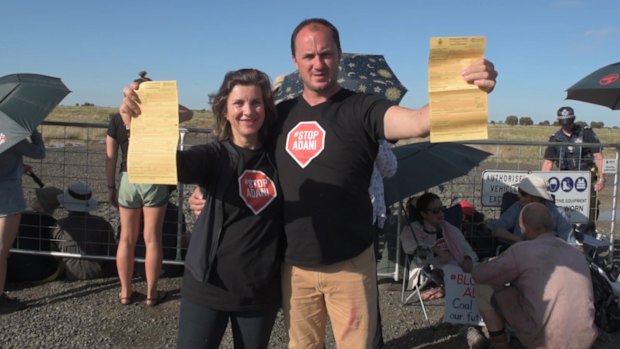 NSW Greens upper house MPs Jeremy Buckingham and Dawn Walker protest against the Adani mine in central Queensland on Wednesday.