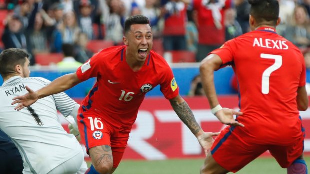 Martin Rodriguez and Alexis Sanchez celebrate for Chile.