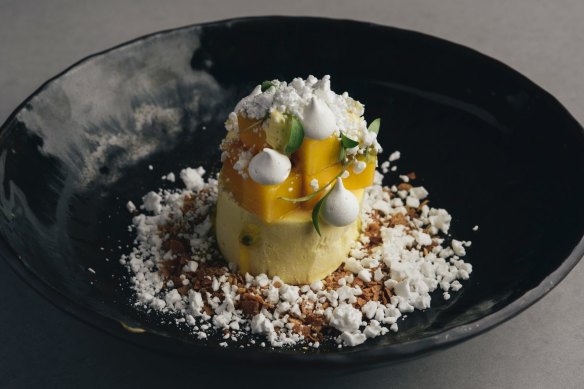 Mango mousse with coconut, passionfruit and white chocolate.