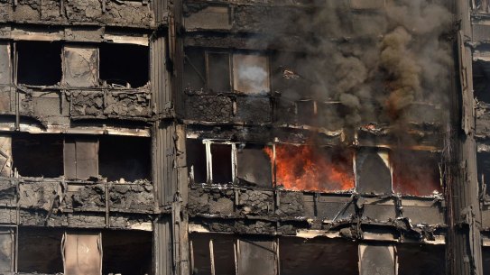 Fires continued to rage in the Grenfell Tower block in London well into the next day.