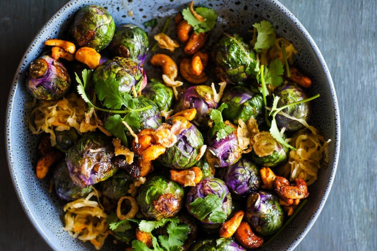 Spicy brussels sprouts with kaffir lime cashews and kimchi recipe.