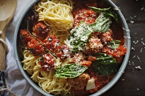 Spaghetti and meatballs served with slow-roasted cherry tomatoes and fontina cheese.