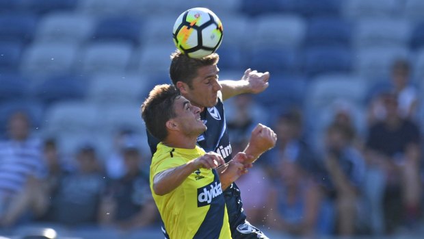 Dino Djulbic, shown here contesting a header with Central Coast striker Asdrubal, will be fit enough to back up on Wednesday against Wellington, Kevin Muscat said. 