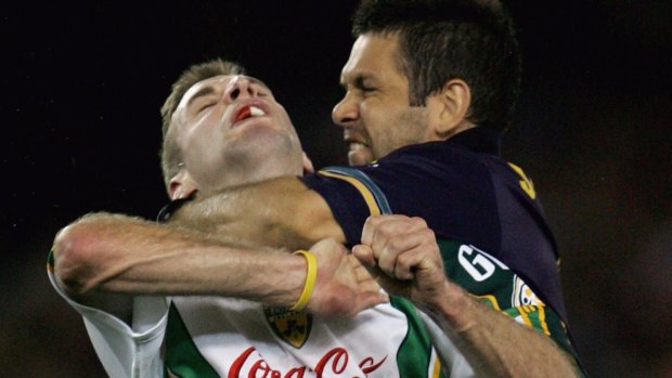 Chris Johnson clashes with Ireland's Mattie Forde in 2005.