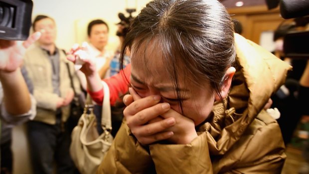 Anguish when relatives learned the plane was missing on March 9, 2014 in Beijing, China.