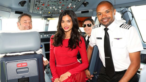 Kelly Gale, dressed in Ginger and Smart, in the cockpit for the Virgin Australia Runway in the Sky.