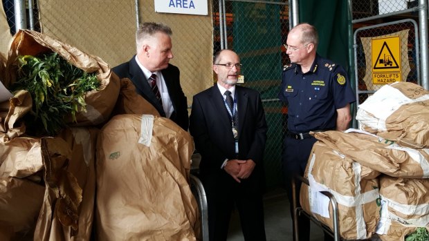 Australian Crime Commission state manager Charlie Carver, Superintendent Mark Slater, and Border Force Queensland Commander Terry Price with some of the drug haul on Wednesday.