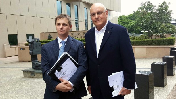 Environmental Defenders Office solicitor Sean Ryan and ACF president Peter Cousins outside the Federal Court in Brisbane on Monday.