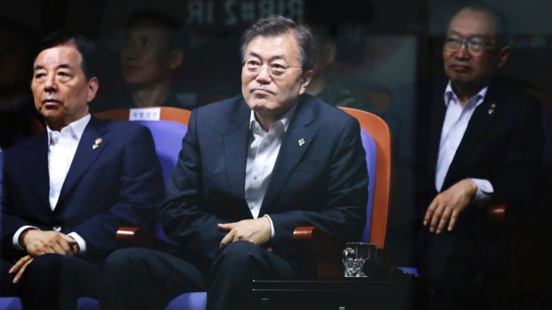 South Korean President Moon Jae-in (middle) watches Friday's test launch.