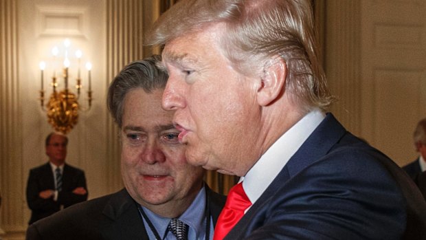 US President Donald Trump and then-White House chief strategist Steve Bannon in the State Dining Room of the White House in Washington in February. 