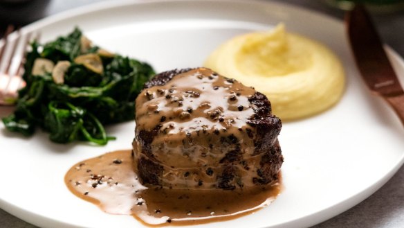 Creamy Paris mash (right) served with filet mignon with creamy peppercorn sauce, and garlic spinach.