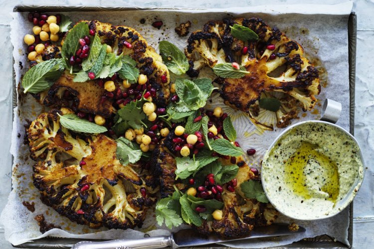 Cauliflower steaks with harissa and honey.