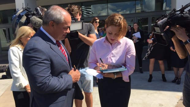 Deputy Premier and Local Government and Planning Minister Jackie Trad discusses the plan with Gold Coast Mayor Tom Tate.