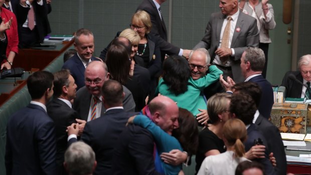 The scenes from the House of Representatives when the laws passed on Thursday.