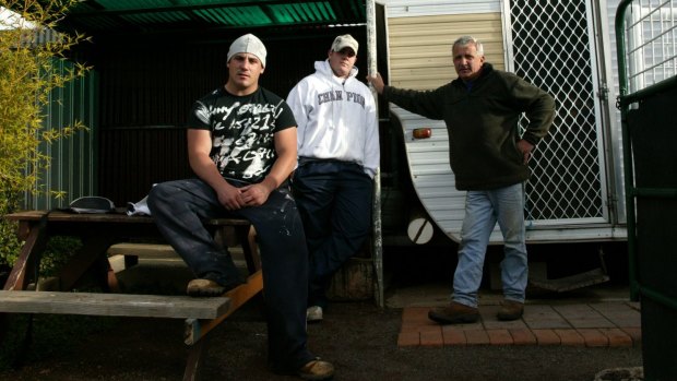 "If I gave my sons $300,000 each it would just stuff their lives up": Joe Janiak at his Queanbeyan stables with sons Ben, at left, and Scott.