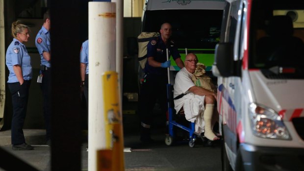 Patients being moved from the Epworth Hospital in Victoria Street after severe flooding.