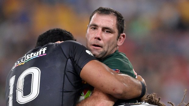 Kiwi challenge: Cameron Smith is tackled during the Four Nations match against New Zealand in October.