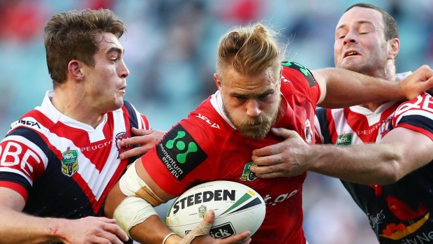 Anzac clash: Jack De Belin meets the Roosters defensive line in their clash in August last year.