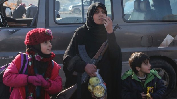 Syrians evacuated from Aleppo during the ceasefire arrive at a refugee camp in Rashidin, near Idlib.