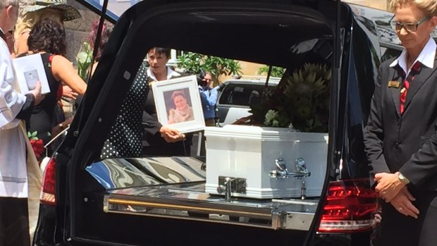 Lloyd's casket leaves her funeral.