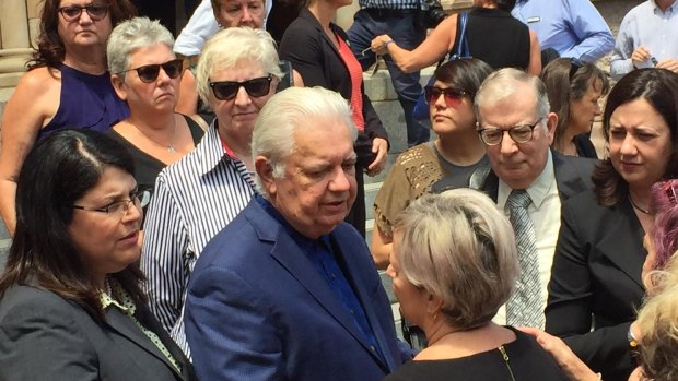 Family friends including former state MP Henry Palaszczuk with daughter and premier Annastacia Palaszczuk and MP Grace Grace console Ms Lloyd's partner Annie Haydon at Monday's funeral.