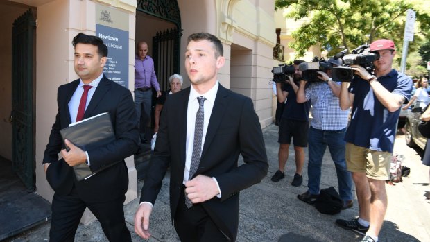 Jordan Duffy, 19, (right) leaves Newtown Local Court with barrister Arjun Chhabra on Thursday. 