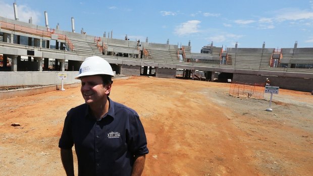 Rio Mayor Eduardo Paes inspects construction work at the Olympic Park's Tennis Centre in December..