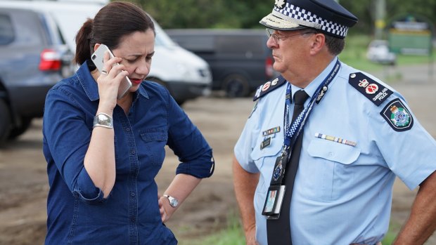 Premier Annastacia Palaszczuk inspecting damage to the John Muntz Bridge on Friday, following the aftermath of wild weather in south-east Queensland.