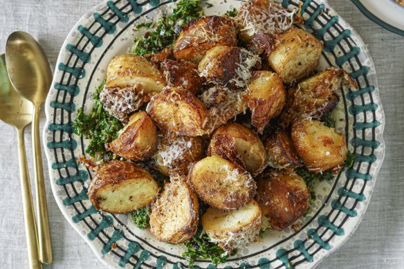 Cacio e pepper roast potatoes on a bed of coriander and olive salsa.