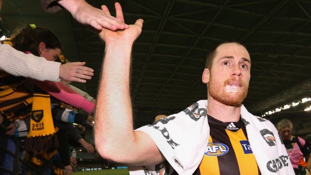 Testing times: Jarryd Roughead of the Hawks after facial surgery last month.