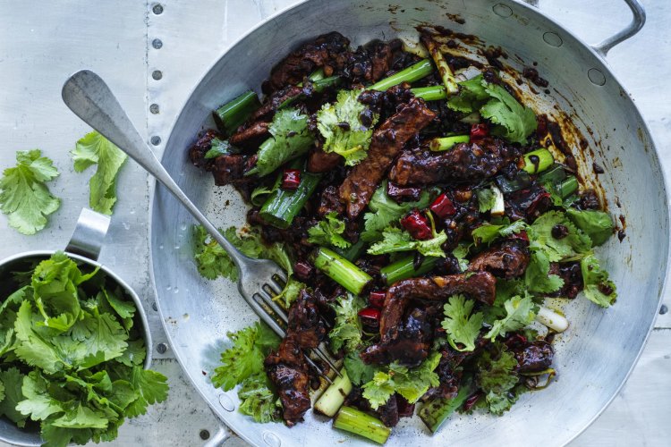 Adam  Liaw's stir-fried lamb with coriander and Sichuan pepper.