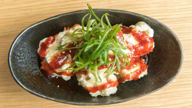 Cauliflower with sweet, dark chilli sauce is like vego Korean fried chicken.
