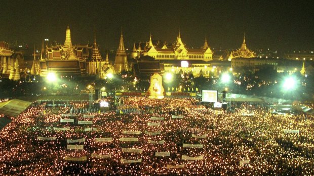 Thai people outside the Grand Palace as part of the King's 80th birthday celebrations in 2007.