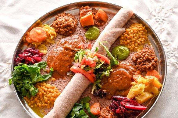 Omnivore combination platter on injera bread.