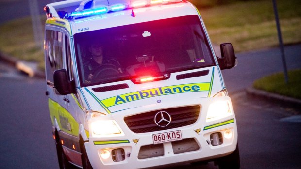 A woman has died after her car collided with a truck south of Gympie.