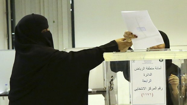 Saudi women vote at a polling centre during municipal elections in Riyadh last year. 