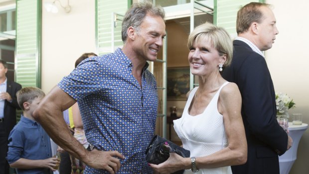 "Sixty is the new 40": Julie Bishop with her partner, David Panton, at a reception hosted by the Prime Minister for the Australian and Indian cricket teams at Kirribilli House on Thursday. She says older workers have a great deal to offer in skills and experience.