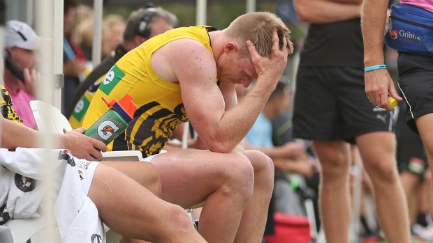 Injury worries? Jack Riewoldt reacts after leaving the field.
