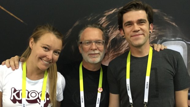 Aussies Leah Hughes and Hugo Davidson of Knog at CES with their United States representative Brian Mark.