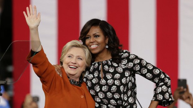 Hillary Clinton with first lady Michelle Obama at a rally in North Carolina.