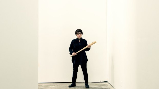 Artist Mami Kataoka had a practice swing of the bat on Friday.