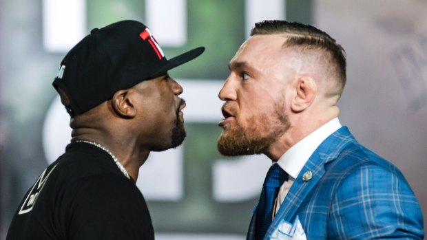 Floyd Mayweather, left, and Conor McGregor went head-to-head again on Thursday.