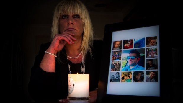 Therese Stevens with pictures of her son, Graham, who was killed by his girlfriend Lisa McLaughlin. 