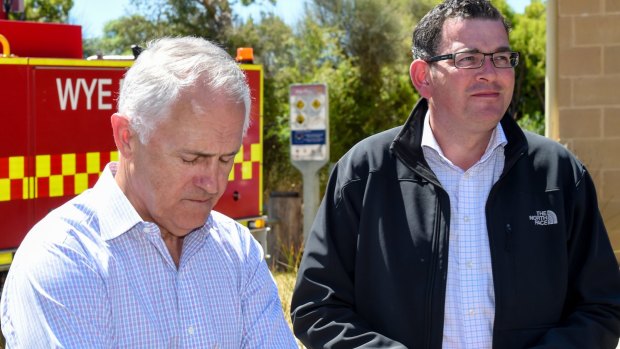 Prime Minister Malcolm Turnbull inspects bushfire damage in Victoria with  Premier Daniel Andrews on Tuesday, shortly before the twin cabinet announcements.