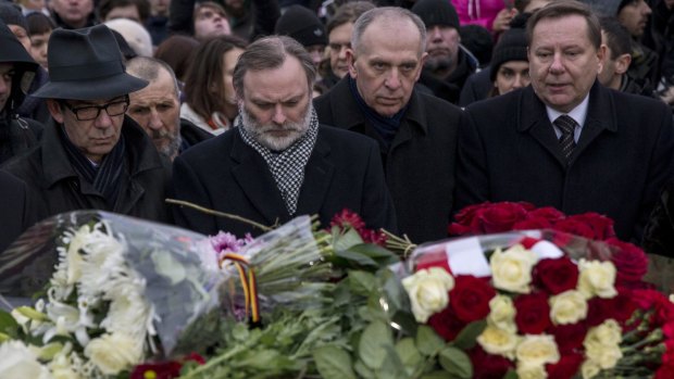 A group of European Union ambassadors to Russia lay flowers at the place where Boris Nemtsov, a Russian opposition leader, was gunned down.