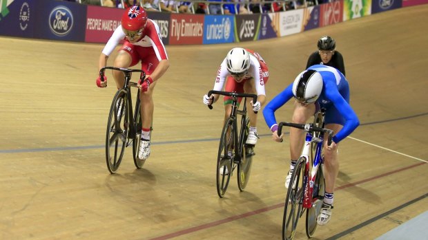Tight finish: Trott (L) speeds around Wales's  Elinor Barker (C) to claim the gold.