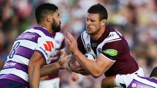 Eagle rock: Manly's Luke Burgess (right).