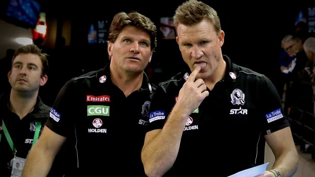 Forward thinking: Magpies coach Nathan Buckley and his assistants will need to devise a new-look forward structure to take on the Western Bulldogs.