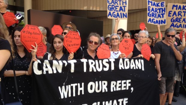Protesters gathered as Adani's local mining chief executive Jeyakumar Janakaraj spoke at a business lunch in Brisbane.
